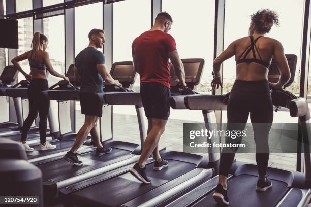 People Using Treadmill 71 Woman Sprinting On Treadmill Stock Photos, High-Res Pictures, and ...