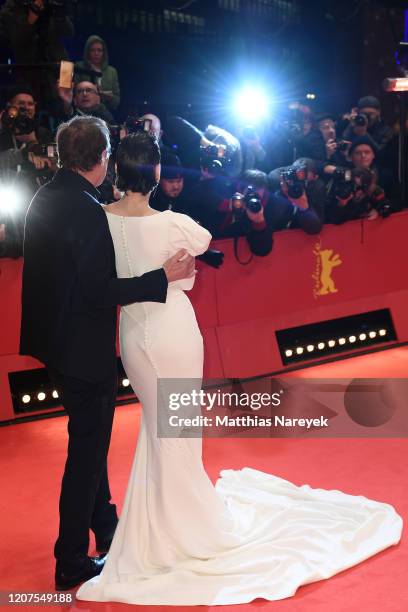 Merek Becker and Sebastian Koch arrive for the opening ceremony and "My Salinger Year" premiere during the 70th Berlinale International Film Festival...