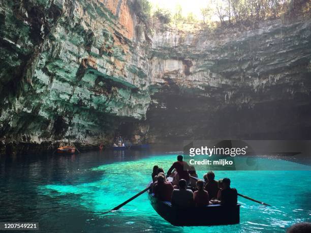 melissani cave and lake - cefalónia imagens e fotografias de stock