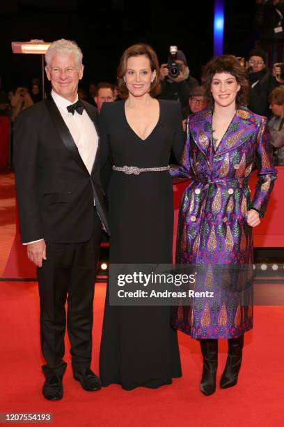 Sigourney Weaver with husband Jim Simpson and daughter Charlotte Simpson arrive for the opening ceremony and "My Salinger Year" premiere during the...