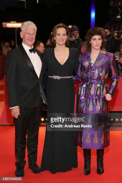 Sigourney Weaver with husband Jim Simpson and daughter Charlotte Simpson arrive for the opening ceremony and "My Salinger Year" premiere during the...