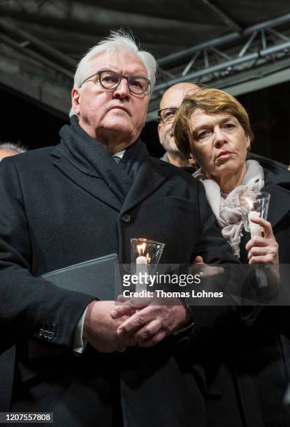 German President Frank-Walter Steinmeier and his wife Elke Buedenbender attend a vigil for the victims near the Midnight shisha bar, one of the sites...