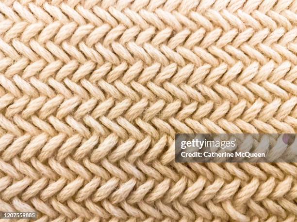 hand-knit herringbone pattern - knitted stock pictures, royalty-free photos & images