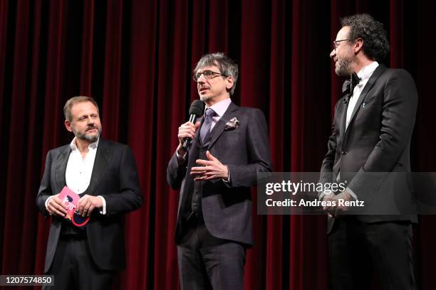 Director Philippe Falardeau speaks next to Samuel Finzi and Artistic Director of Berlinale Carlo Chatrian on stage at the opening ceremony and "My...