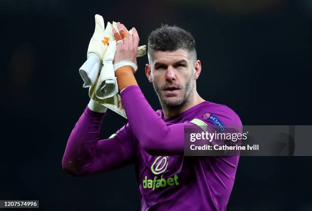 Fraser Forster of Celtic applauds fans after the UEFA Europa League round of 32 first leg match between FC Kobenhavn and Celtic FC at Telia Parken on...