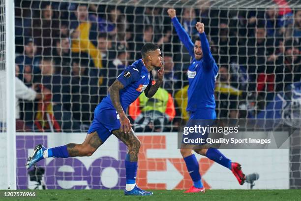 Robert Kenedy of Getafe CF celebrates after scoring his team's secobnd goal during the UEFA Europa League round of 32 first leg match between Getafe...