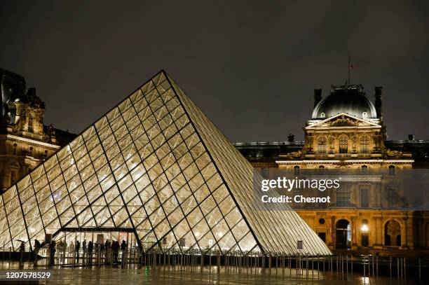 The Louvre Pyramid and the Louvre museum are seen at night on February 20, 2020 in Paris, France. The prestigious Leonardo da Vinci exhibition at the...