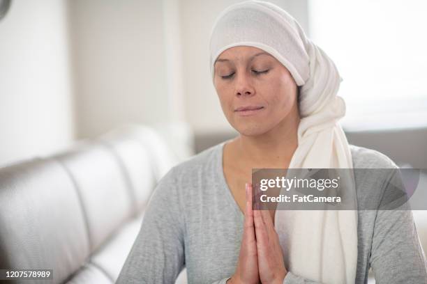 cancer patient meditating portrait stock photo - nurse meditating stock pictures, royalty-free photos & images