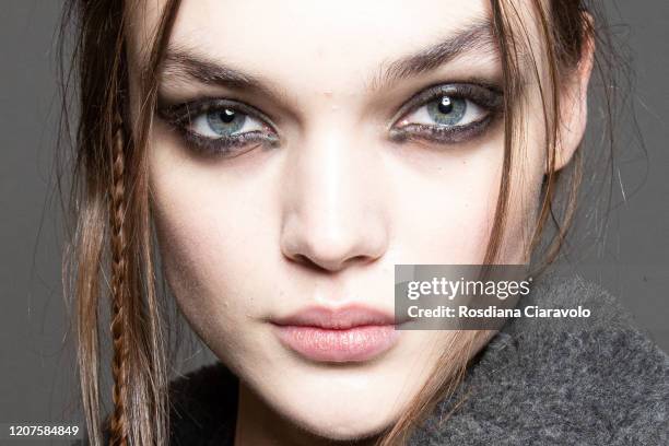 Shayna McNeill , make up detail, is seen backstage at the Max Mara fashion show on February 20, 2020 in Milan, Italy.