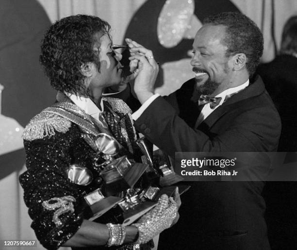Michael Jackson and Quincy Jones backstage during the 26th Annual Grammy Awards at the Shrine Auditorium, February 28, 1984 in Los Angeles,...