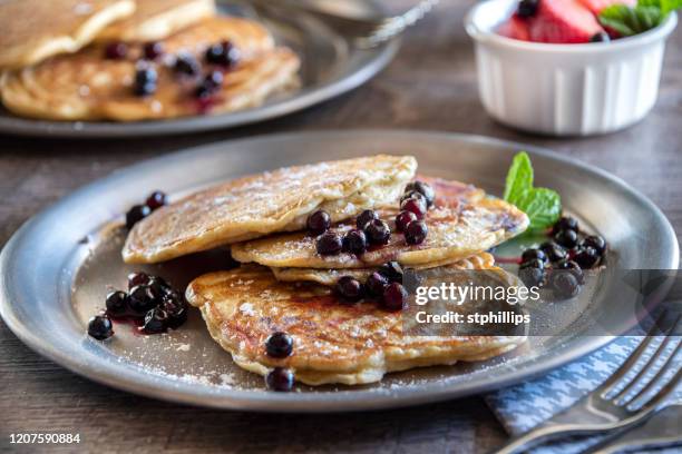 stack of rustic sourdough blueberry pancakes - blueberry pancakes stock pictures, royalty-free photos & images