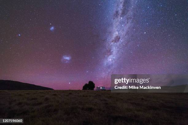 milky way over a campervan in tekapo - southern lights ストックフォトと画像