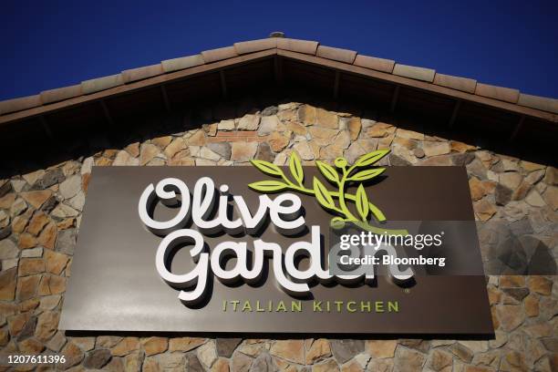 Signage is displayed outside a Darden Restaurants Inc. Olive Garden restaurant in Clarksville, Indiana, U.S., on Thursday, March 5, 2020. Darden...