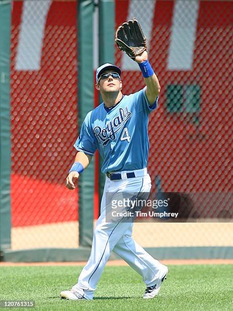 Left fielder Alex Gordon of the Kansas City Royals catches a fly ball in a game against the Detroit Tigers at Kauffman Stadium on August 7, 2011 in...