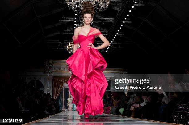 Cara Taylor walks the runway during the Moschino fashion show as part of Milan Fashion Week Fall/Winter 2020-2021 on February 20, 2020 in Milan,...