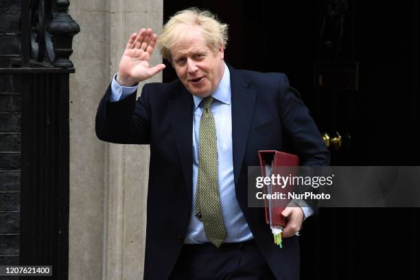 Boris Johnson leaves 10 Downing Street in central London on March 18 to take part in Prime Minister's Questions at the House of Commons. The British...