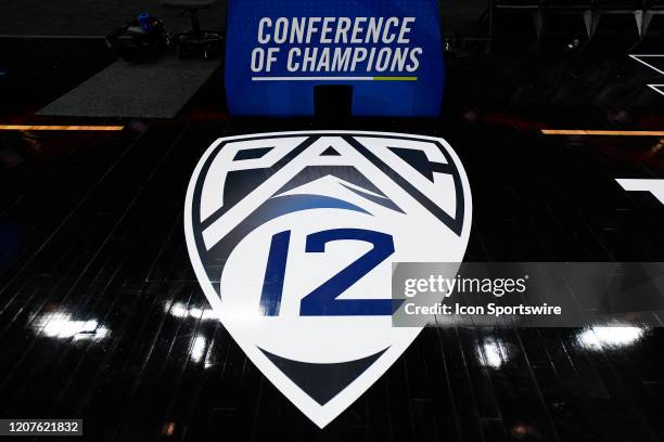 The Pac-12 logo on the court the first round game of the men's Pac-12 Tournament between the Oregon State Beavers and the Utah Utes on March 11 at...