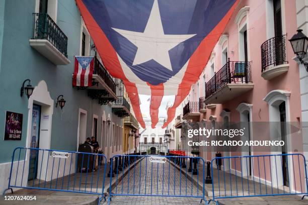 Barricades block the entrance to the Governor's mansion known as La Fortaleza in San Juan, Puerto Rico on March 18, 2020. - On Sunday March 15,...