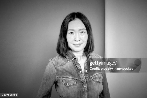 a black and white portrait of a beautiful 50 year old woman - 50 year old japanese woman bildbanksfoton och bilder