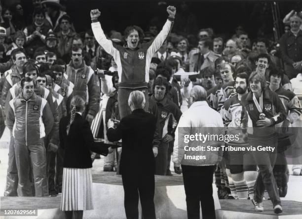 Lake Placid, NY. February 22: United States defenseman Jack O'Callahan raises his arms in celebration prior to receiving his gold medal at the 1980...