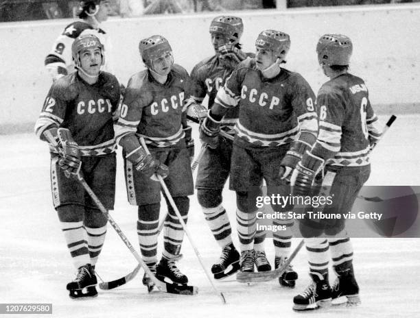 Lake Placid, NY. February 22: Members of the Soviet Union skate back to the bench after a goal vs. The United States during a medal round game at the...