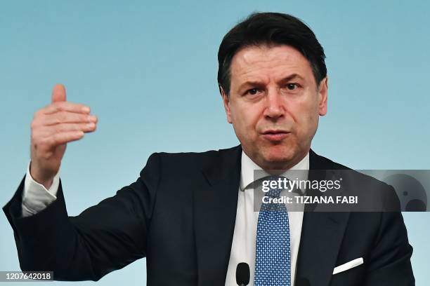 In this photo taken on March 04, 2020 Italy's Prime Minister Giuseppe Conte speaks during a press conference held at Rome's Chigi Palace, following a...