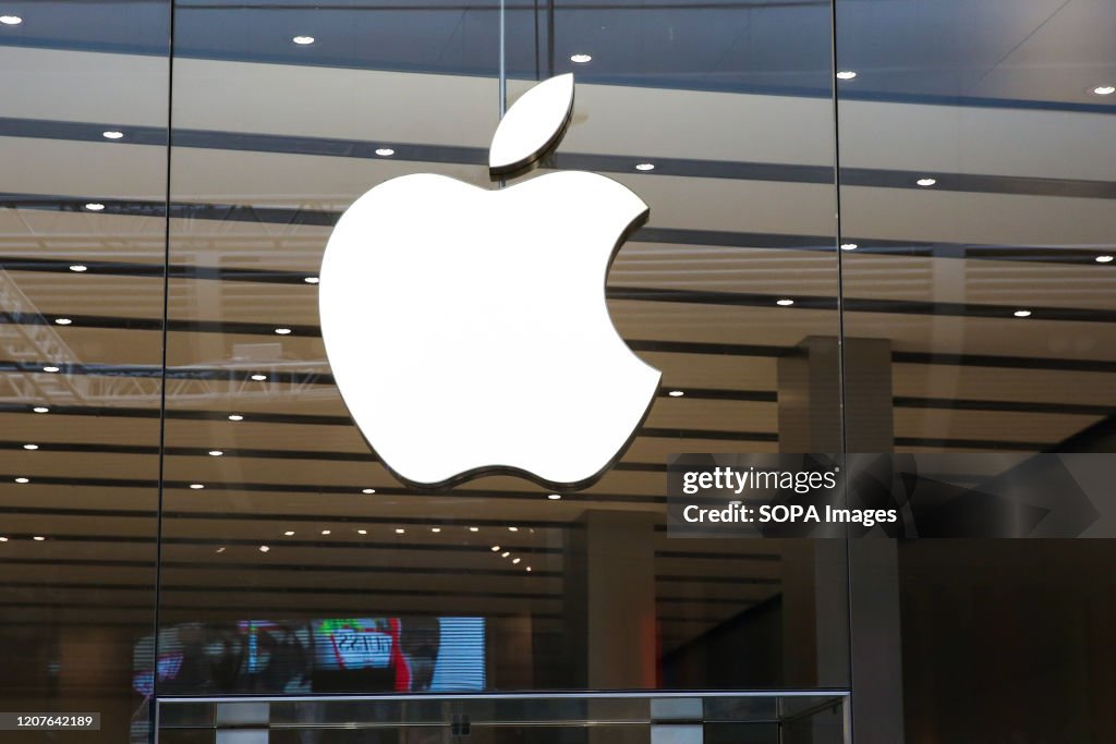 Apple's logo on its store window in London, UK...