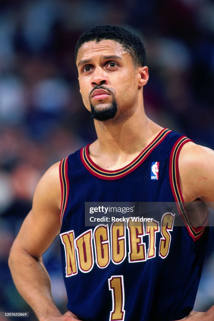 Muhammad Rauf Mahmoud Abdul-Rauf of the Denver Nuggets looks on during a game... News ...