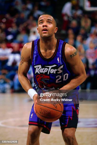 Damon Stoudamire of the Toronto Raptors shoots the ball during a game played at the Arco Arena in Sacramento, California circa 1993. NOTE TO USER:...