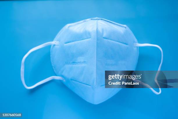 Regular Blue Mask Blue N95 Mask Photos and Premium High Res Pictures - Getty Images
