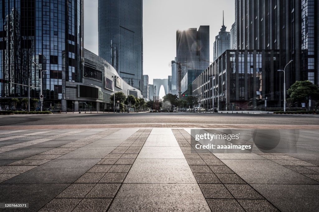 Empty pavement with modern architecture