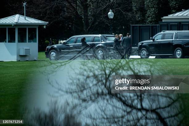 President Donald Trump walks to his armoured limo at the White House to travel to the headquarters of FEMA to attend a tele-briefing with governors...
