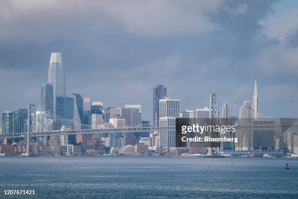 Buildings stand in the San Francisco skyline viewed from the Port of Oakland in Oakland, California, U.S., on Thursday, March 19, 2020. The spread of...