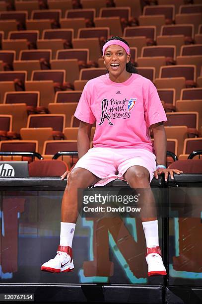 Asjha Jones of the Connecticut Sun poses for the camera wearing a special t-shirt in support of the WNBA's Breast Health Awareness initiative prior...