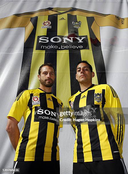 Andrew Durante and Leo Bertos model the new Wellington Phoenix shirts during the launch of the new Wellington Phoenix kit on August 10, 2011 at...