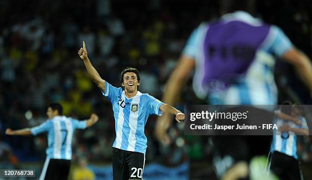 Carlos Luque of Argentina celebrates with his teammates at the end of the FIFA U-20 World Cup Colombia 2011 round of 16 match between Argentina and...