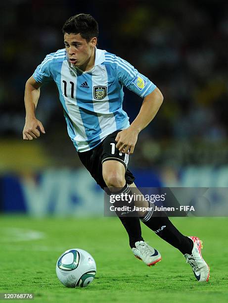 Juan Iturbe of Argentina runs with the ball during the FIFA U-20 World Cup Colombia 2011 round of 16 match between Argentina and Egypt at the...