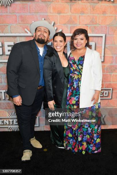 Marvin Bryan Lemus, America Ferrera, and Linda Yvette Chavez attends the premiere of Netflix's "Gentefied" at Plaza de la Raza on February 20, 2020...