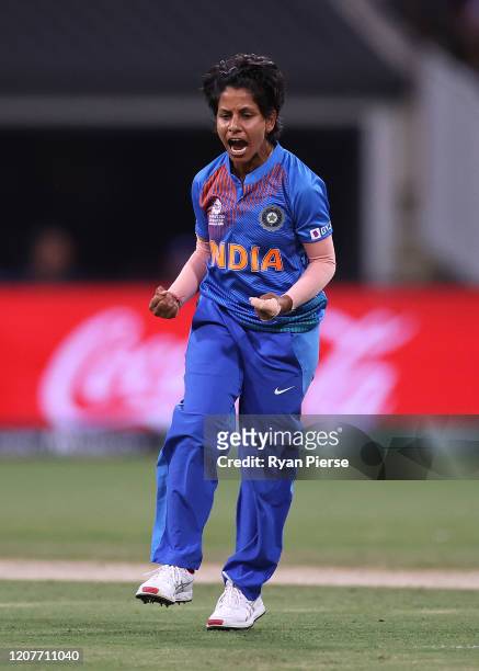 Poonam Yadav of India celebrates after taking the wicket of Alyssa Healy of Australia during the ICC Women's T20 Cricket World Cup match between...