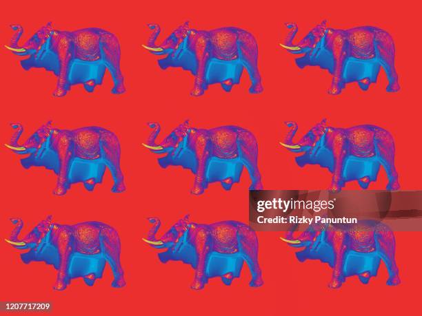 elephant toy against colored background - pink elephant stock pictures, royalty-free photos & images