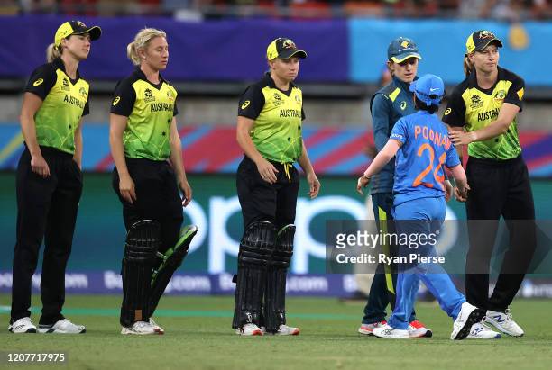 Meg Lanning of Australia congratulates Poonam Yadav of India after the ICC Women's T20 Cricket World Cup match between Australia and India at Sydney...