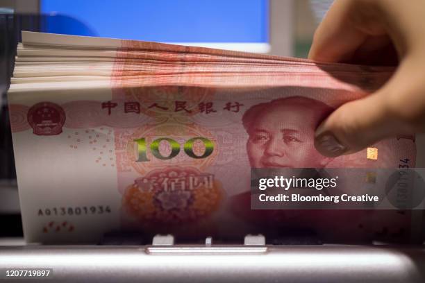 chinese 100 yuan banknote - billete de yuan chino fotografías e imágenes de stock