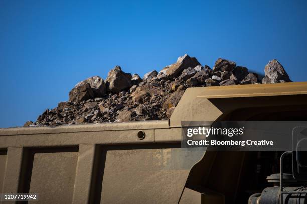 raw ore at an open-pit mine - mountain pass stock pictures, royalty-free photos & images