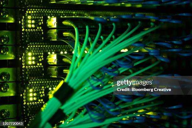 computer fibre optic network cables - inside data cable stock pictures, royalty-free photos & images