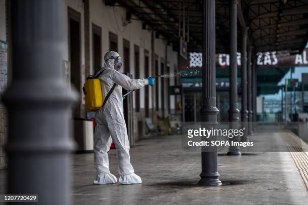 Member of the UME seen disinfecting the train station in Granada. The UME has returned to Granada to disinfect some of the city's hot spots such as...