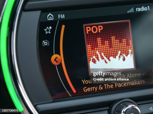 March 2020, Berlin: The song title "You'll Never Walk Alone" is shown on the display of a car radio. On the initiative of Dutch public radio, more...