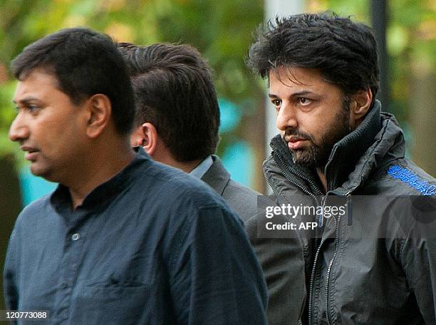 Shrien Dewani arrives at Belmarsh Magistrates' Court sitting at Woolwich Crown Court in south London, on August 10 ahead of an expected judgement...