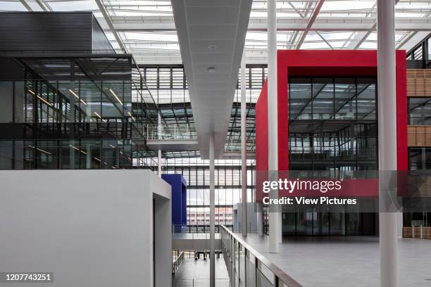 Upper floor with rectangular volumes and window wall view through. Research Centre of the Urbalad Campus, Michelin, Cebazat, France. Architect: Chaix...