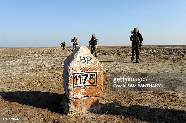 Indian Border Security Force jawans - soldiers - patrol at Border Pillar No 1175, the last international border pillar along the horizontal segment...