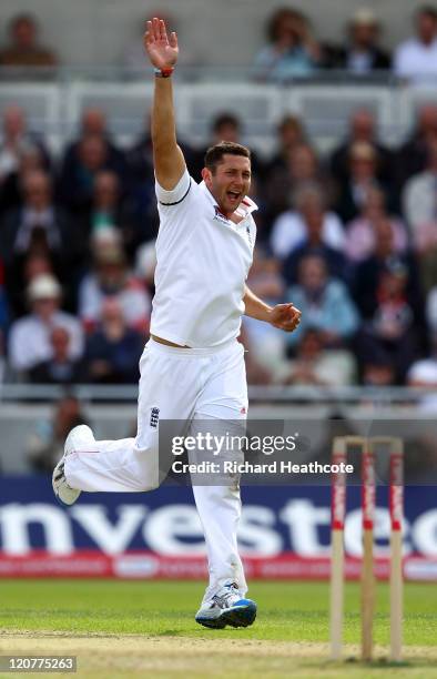 Tim Bresnan of England claims the wicket of Praveen Kumar of India during day one of the 3rd npower Test at Edgbaston on August 10, 2011 in...